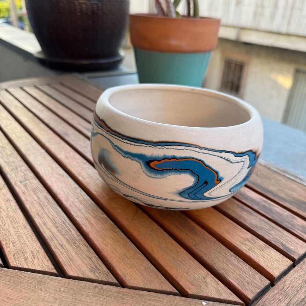 Handmade Nemadji Pottery Bowl With Blue & Orange Swirl Design